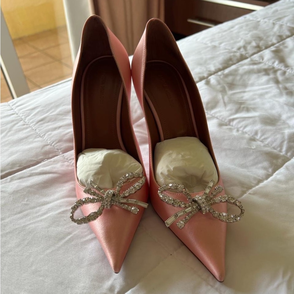 Amina Muaddi pink heels with crystal bow.
Brand new never worn!